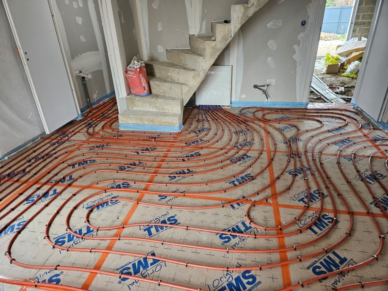 Installation d'un plancher chauffant avec isolant de sol à Val de Reuil dans le 27